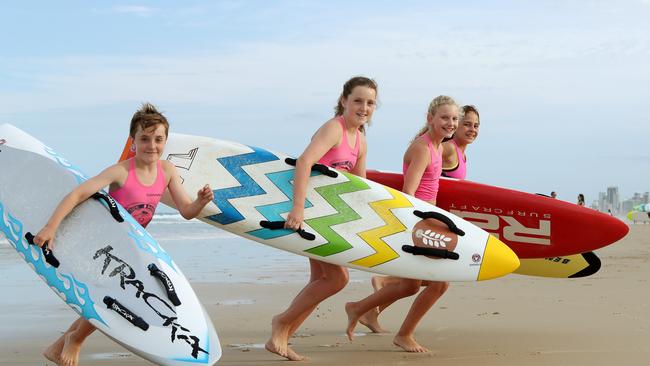 Southport Surf Life Saving Club is celebrating the 50th anniversary of its nipper program. Southport Nippers Ruby Barrett (12), Ted Barrett (11), Freya Brown (10) and Brooke Malcolm (10). Picture by Scott Fletcher