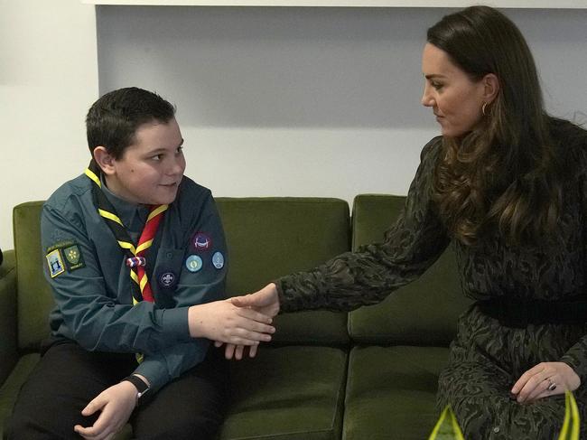 Kate Middleton meets 13-year-old scout Leo Street who raised $15,000 for the organisation. Picture: Getty Images