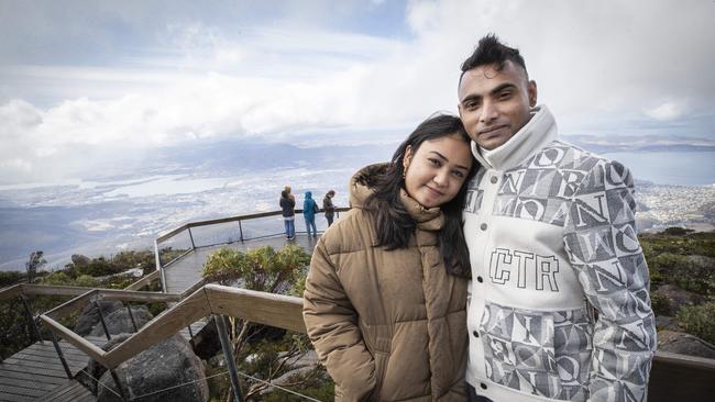 Aditi Shahi and Shyam Maharjan of Sydney at the kunanyi/ Mount Wellington summit. Picture: Chris Kidd