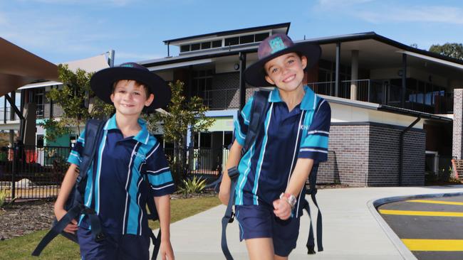 Year 3 students Josh Day and Ayla Garaty outside the school.