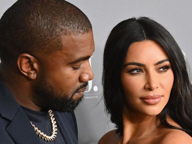 (FILES) In this file photo US media personality Kim Kardashian West (R) and husband US rapper Kanye West attend the WSJ Magazine 2019 Innovator Awards at MOMA on November 6, 2019 in New York City. - Reality TV star Kim Kardashian has filed for divorce from rapper Kanye West after almost seven years of marriage, US media reported February 19.   Kardashian's lawyer Laura Wasser filed papers confirming a split first rumored back in January, when the mega-celebrity couple were reported to be living separately, Fox News said. (Photo by Angela Weiss / AFP)