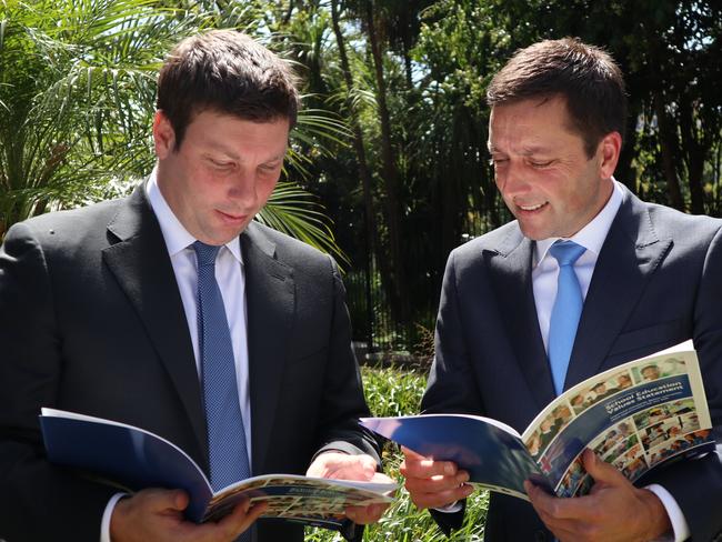 Victorian Opposition Leader Matthew Guy (r) presents his Schools Education Values Statement alongside Opposition Education Minister Tim Smith at the Victorian Parliament, Melbourne, Wednesday, January 24, 2018. (AAP Image/Alex Murray) NO ARCHIVING