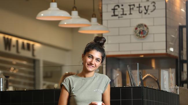 Mary Rahmani at cafe Fifty 3: “They don’t go to work anymore but they just come to support us to get their coffee.” Picture: Tait Schmaal