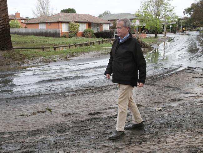 Bill Shorten inspects the area following flooding in Maribyrnong in 2022. Picture: David Crosling