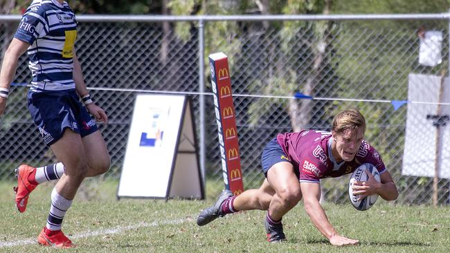 University’s Dougal Perrrers scores.(Image Sarah Marshall)