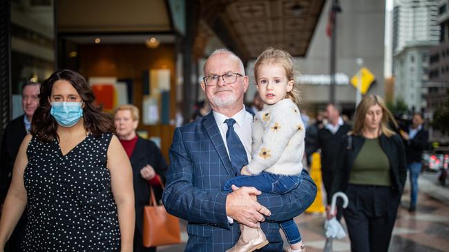 Michael Duke, pictured with his granddaughter Willow, addressed the press in regards to his wife's death, Jo Duke. Picture: NCA NewsWire / Christian Gilles