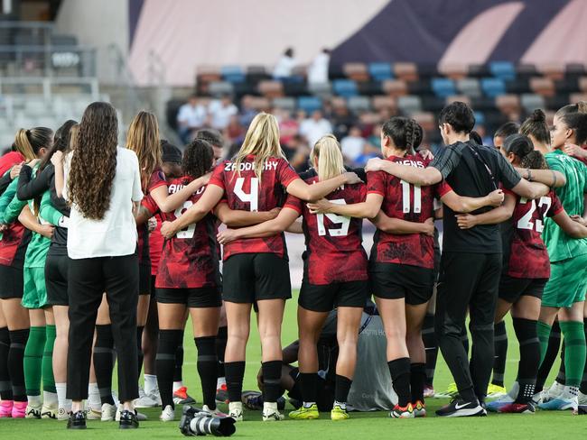 HOUSTON, TEXAS - FEBRUARY 25: The Canada Womens National Team huddles following a Group C - 2024 Concacaf W Gold Cup game against Paraguay at Shell Energy Stadium on February 25, 2024 in Houston, Texas. (Photo by Alex Bierens de Haan/Getty Images)