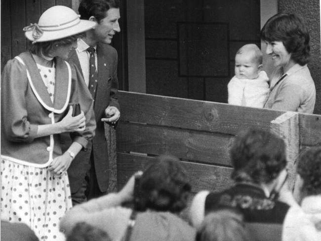 The couple visiting Paisley housing estate, Altona, and meeting Glenda McCormack with baby Dean.