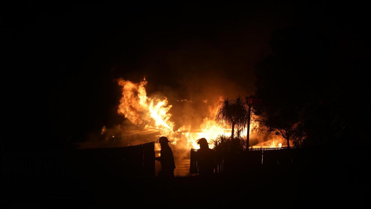 A Blake Street property went up in flames on Sunday night, February 16 with firefighters at the scene containing it. Photo: Adam Randell Photography