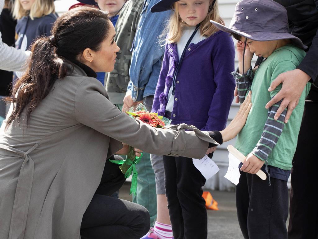 Meghan, Duchess of Sussex consoles Joe Young following a meeting with young people from a number of mental health projects operating in New Zealand in Wellington, New Zealand, Monday, Oct. 29, 2018. Prince Harry and his wife Meghan are on day 14 of their 16-day tour of Australia and the South Pacific. (Ian Vogler/Pool Photo via AP)