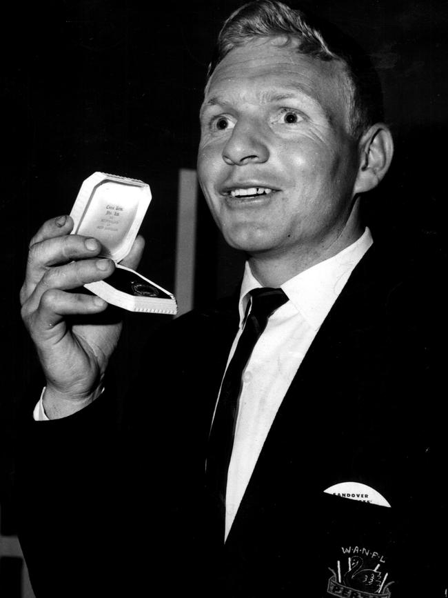 Champion rover Barry Cable holds the 1964 Sandover Medal. Picture: West Australian Newspapers Limited