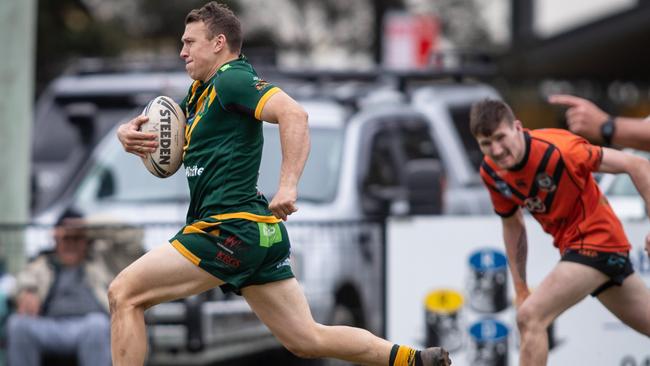 Mittagong’s Jake Mercieca runs in a try. News Local, Pictures by Julian Andrews.