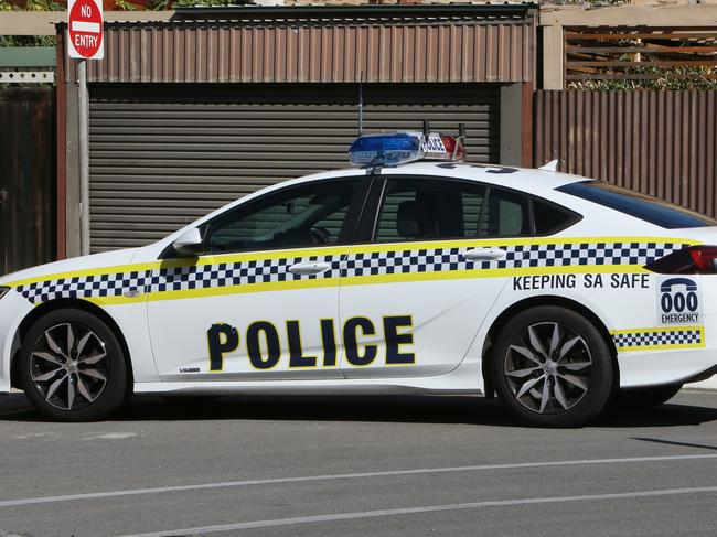 Generic Image A parked South Australian Police Car at a Unit fire in Glenelg, S.A. (AAP/Emma Brasier)