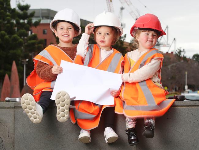 Asher, Eli and Elisie plan for the future of Geelong. Three Geelong children building a better future for Geelong. To go with the launch of the Future Geelong Awards, future leaders of the region in construction gear, ready to help build Geelong's future. Picture: Alan Barber