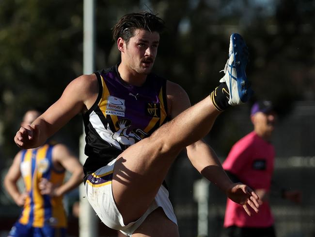 Tom Boyd kicks a goal for Norwood. Picture: Mark Dadswell