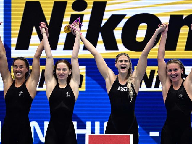 (L-R) Brianna Throssell, Mollie O'Callaghan, Shayna Jack and Ariarne Titmus celebrate their win in the women's 4x200m freestyle relay swimming at last year’s World Aquatics Championships. Picture: Yuichi Yamazaki / AFP