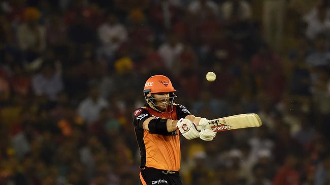 Sunrisers Hyderabad batsman David Warner plays a shot during the 2019 Indian Premier League (IPL) Twenty20 cricket match between Kings XI Punjab and Sunrisers Hyderabad at the Punjab Cricket Association Stadium in Mohali on April 8, 2019. (Photo by Money SHARMA / AFP) / ----IMAGE RESTRICTED TO EDITORIAL USE - STRICTLY NO COMMERCIAL USE----- / GETTYOUT