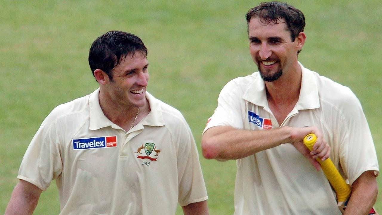 Gillespie with Michael Hussey during his double century against Bangladesh.