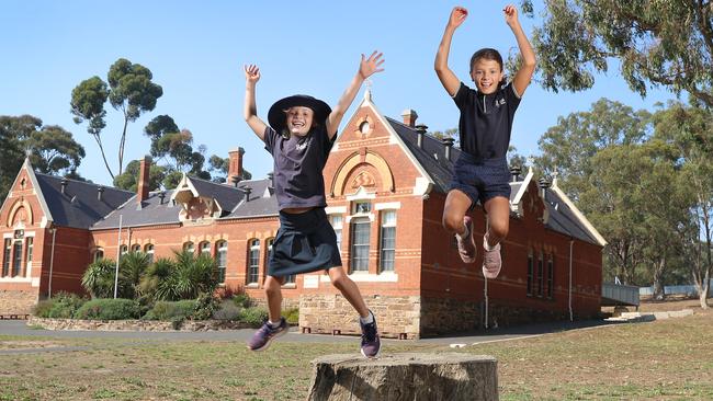 Alice, 8, and Essie, 10, will benefit from new school supplies. Picture: Alex Coppel.