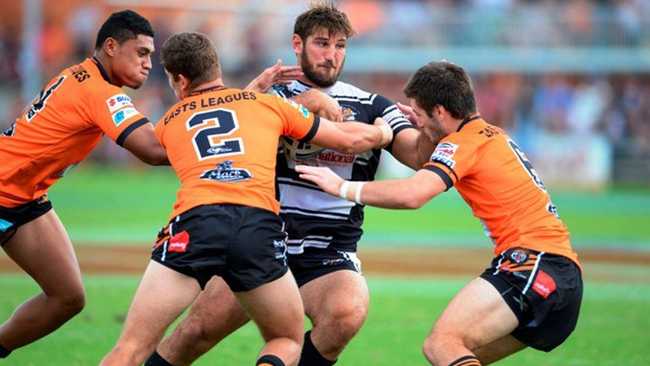 Seagulls stand-in Dave Taylor shows the Easts Tigers that taking him down is no easy feat. Picture: Steve Bell/SMP Images
