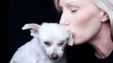 Rescued With Love founder Kae Norman with one of her charges. Picture: Contributed
