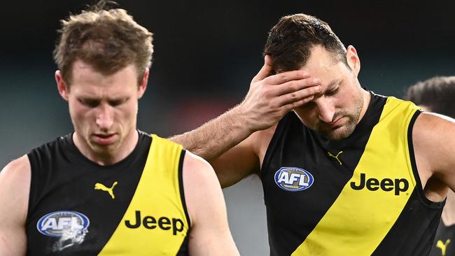 MELBOURNE, AUSTRALIA - JULY 25: Dylan Grimes and Toby Nankervis of the Tigers  look dejected after losing the round 19 AFL match between Geelong Cats and Richmond Tigers at Melbourne Cricket Ground on July 25, 2021 in Melbourne, Australia. (Photo by Quinn Rooney/Getty Images)