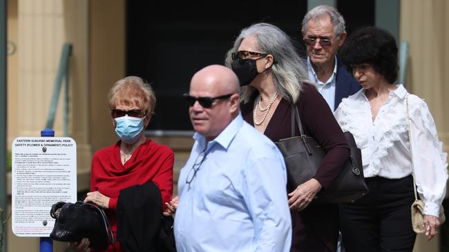 Melissa Caddick’s brother Adam Grimley (second from left) at the Eastern Suburbs Memorial Park. Picture: John Grainger