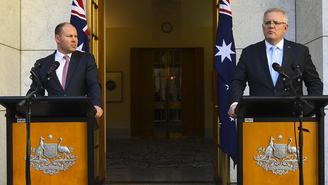 Australian Prime Minister Scott Morrison and Australian Treasurer Josh Frydenberg speak to the media. Picture: AAP