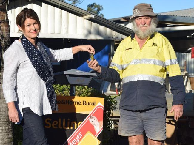 Danielle Meyer with first home byer Rodney Marshall in Mundubbera. Picture: Philippe Coquerand