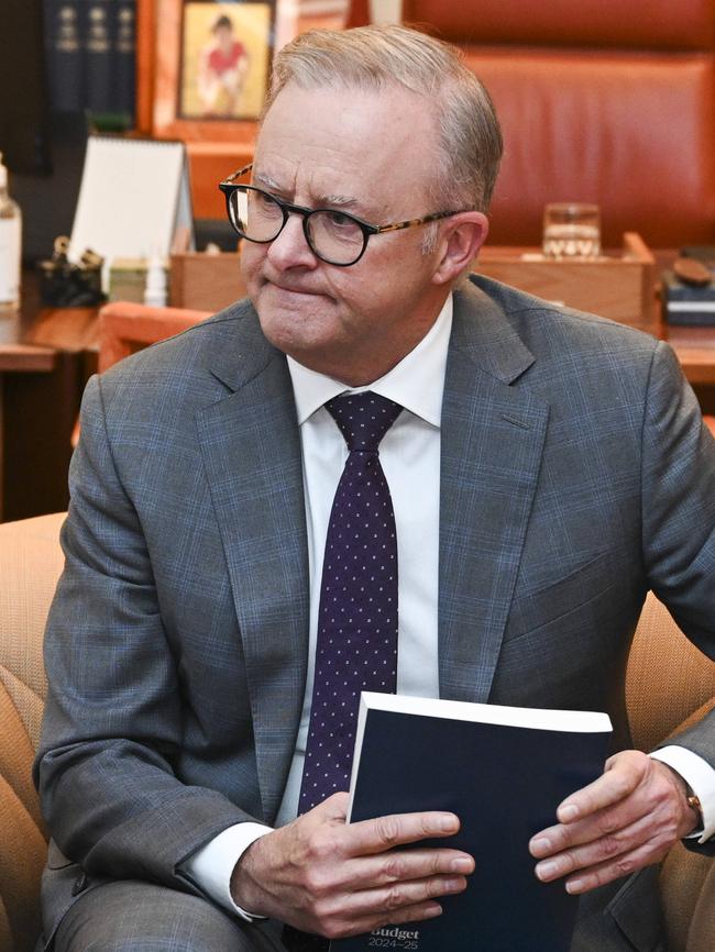 Mr Albanese with the budget papers. Picture: NCA NewsWire / Martin Ollman