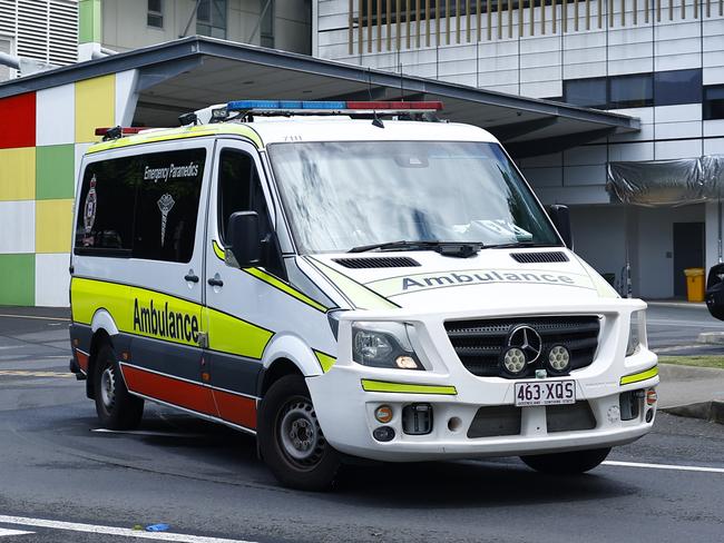 A Queensland Ambulance departs the emergency department of the Cairns Hospital on the Esplanade. Picture: Brendan Radke