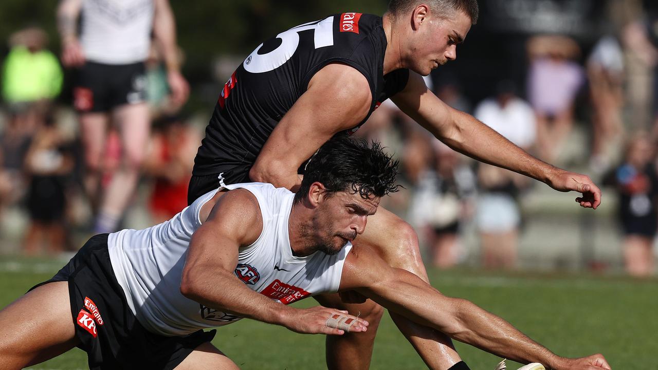 Scott Pendlebury battles with Josh Carmichael during the Collingwood scratch match. Picture: Michael Klein