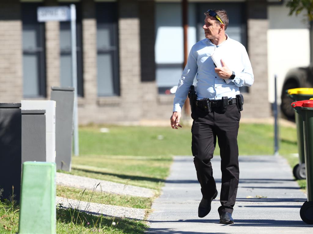 Detectives door knock houses near Rupert Terrace at Morayfield. Picture Lachie Millard