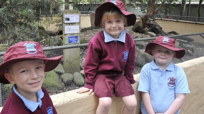 Riley Green, 6, Ashlee Kolkman, 5, and Chloe Crayton, 6, from Seven Hills West Public School at the Tasmanian devil enclosure on September 1, 2011. Picture: Carmela Roche