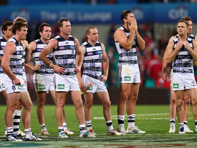Thoroughly beaten: Geelong look dejected after the round 11 AFL match defeat at the hands of the Sydney Swans. Photo by Ryan Pierse/Getty Images