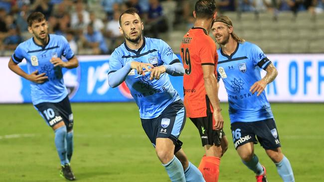 Sydney FC striker Adam Le Fondre celebrates after scoring the sole goal against Brisbane Roar Picture: Getty Images