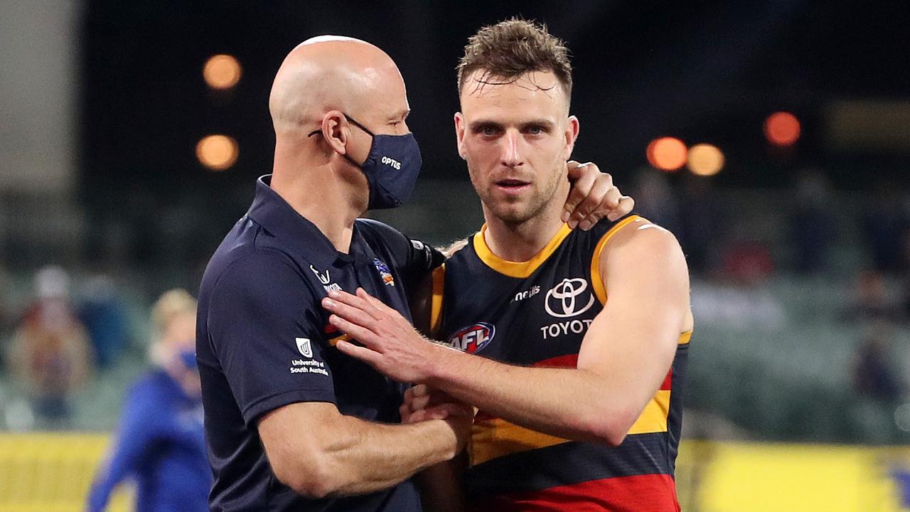 Matthew Nicks with Brodie Smith after the Crows’ Round 23 win.