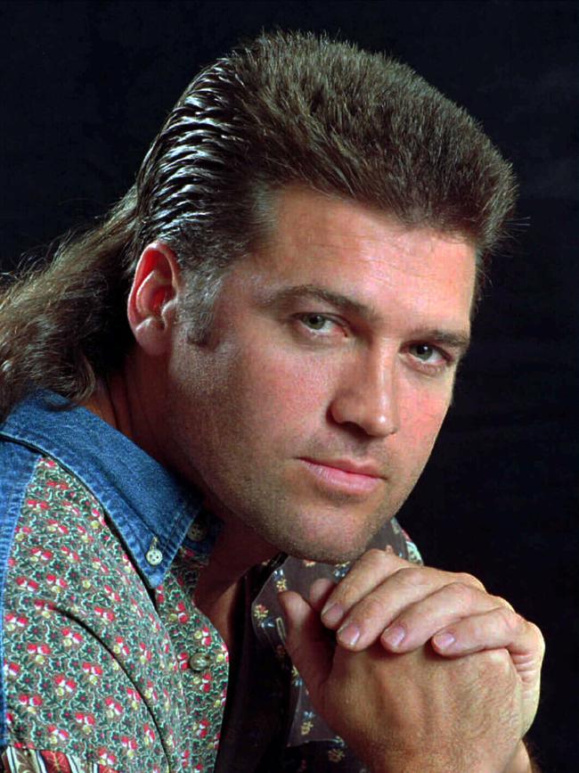 Miley’s dad, singer Billy Ray Cyrus, and his glorious mullet in 1994. Picture: AP