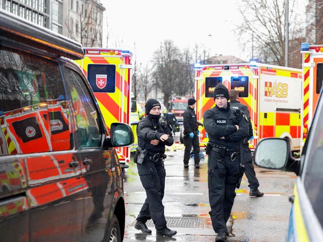 Police work at the scene where a car drove into a crowd in the German city of Munich. Picture: AFP