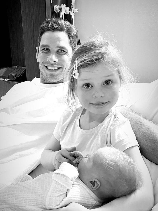 Emma Hawkins posted these gorgeous black and white images of hubby Tom with newborn son Henry and his daughter. Picture: Instagram