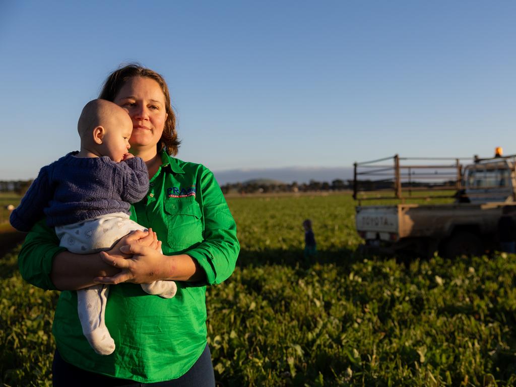 Katherine Myers and son John, 6 months, on her property north of Ballarat where the government has planned to run large high voltage electricity transmission lines across farm land. Picture: Jason Edwards