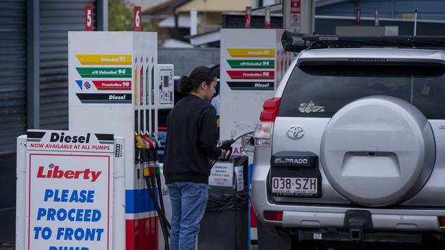 People filling up their cars with diesel at Liberty Highgate Hill on Sunday. Picture: Jerad Williams