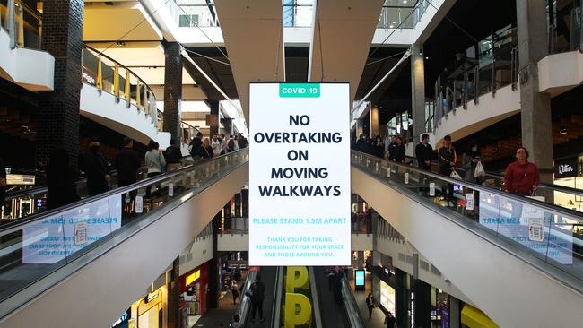 Social distancing signage is seen on display at Broadway Shopping Centre, where there has been a confirmed coronavirus case. Picture: Lisa Maree Williams/Getty Images