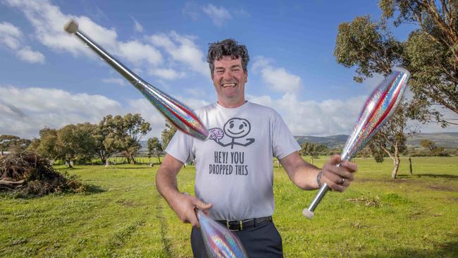 David “Juggs” Russell juggling batons at his property at Aldinga Beach. Picture: Ben Clark