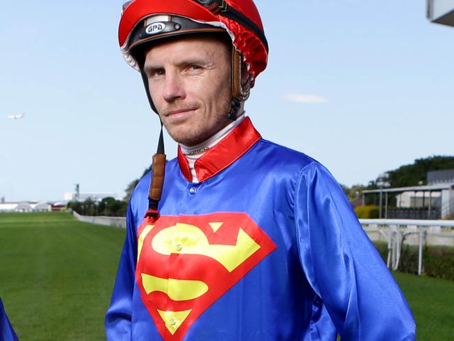 Jockey's Bridget Grylls and Ryan Wiggins. BrisbaneÕs biggest ever superhero party. Pic Darren England..