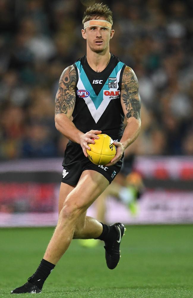 Hamish Hartlett in action during the Round 5 match between the Port and Geelong