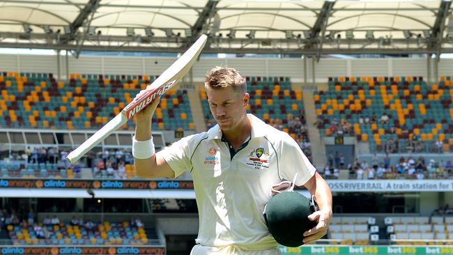 BRISBANE, AUSTRALIA - NOVEMBER 23: David Warner of Australia acknowledges the crowd after losing his wicket on 154 runs during day three of the 1st Domain Test between Australia and Pakistan at The Gabba on November 23, 2019 in Brisbane, Australia. (Photo by Bradley Kanaris/Getty Images)