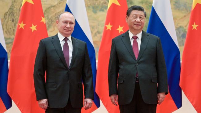 Russia's President Vladimir Putin (L) and his Chinese counterpart Xi Jinping pose during a meeting in February.