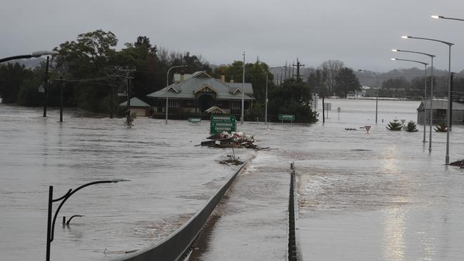 A familiar sight in Windsor as the bridge is under floodwater for the fourth time in 18 months. Picture: John Grainger