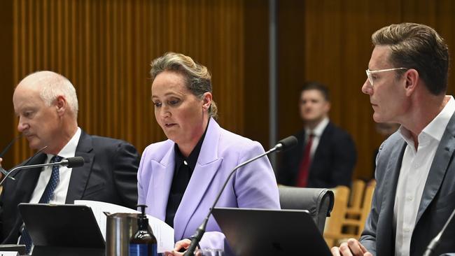 Qantas chairman Richard Goyder, new CEO Vanessa Hudson and Qantas General Counsel Andrew Finch appear before an inquiry into Australia's bilateral airservices arrangements at Parliament House in Canberra. Picture: Martin Ollman/NCA NewsWire